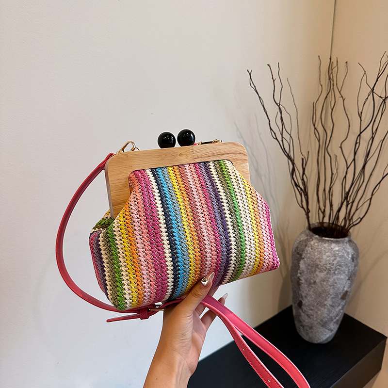 2026 new rainbow striped kiss lock grass woven clip bag woven shoulder bag for women's commuting and leisure crossbody bag